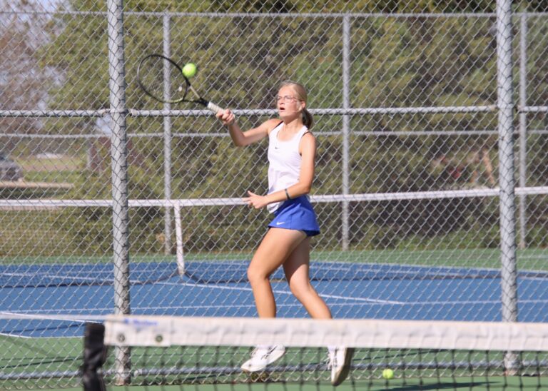 Aberdeen Central's Julia Knie tracks down a forehand near the baseline during heir single match against St. Thomas More Monday, Sept. 16 at the Holgate tennis courts. Aberdeen Insider photo by Robb Garofalo