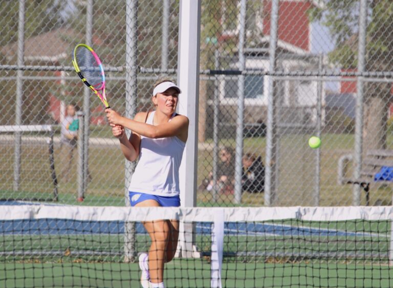 AberdeeCentral tennis team sweeps Roncalli in rivalry matchn Central's Reece Comstock hits a backhand during her double match against Aberdeen Roncalli Saturday, Sept. 21 at Holgate Middle School. Aberdeen Insider photo by Robb Garofalo.