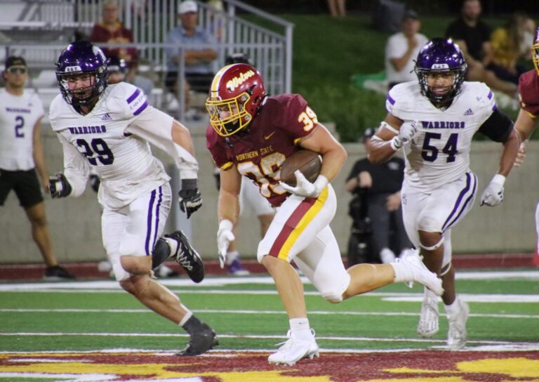 Northern State's Wyatt Block breaks into the open field during the fourth quarter of the Wolves' 30-24 victory Saturday, Sept. 28 against Winona State in Dacotah Bank Stadium. Block would gain 30 yards on the run. Aberdeen Insider photo by Robb Garofalo.