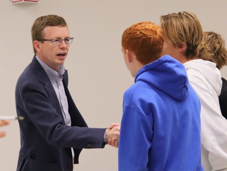U.S. Rep. Dusty Johnson, R-S.D., greets high school students at the Johnson Fine Arts Center on Thursday, Oct. 3. About 250 local students attended his Level Up Youth Conference. Aberdeen Insider photo by Elisa Sand.