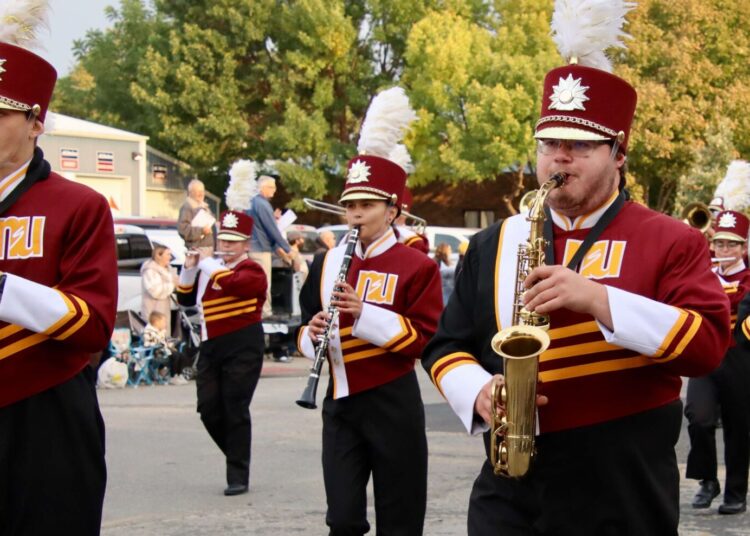 The Northern State University Marching Wolves lead the 2024 homecoming parade down Main Street on Saturday, Oct. 5. Aberdeen Insider photo by Scott Waltman.