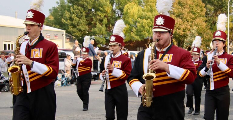 The Northern State University Marching Wolves lead the 2024 homecoming parade down Main Street on Saturday, Oct. 5. Aberdeen Insider photo by Scott Waltman.