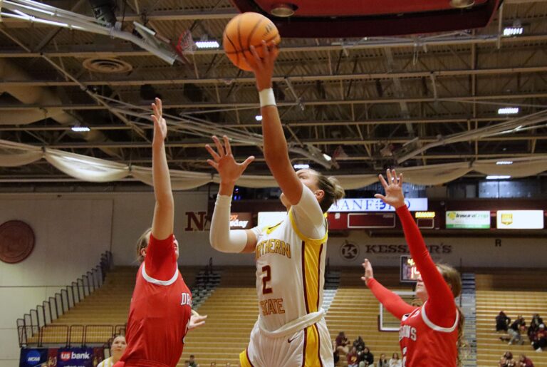Northern State's Madelyn Bragg takes a layup against Minnesota State, Moorhead last season inside the Barnett Center. The Wolves are picked second in the NSIC preseason poll. Bragg has been named preseason player of the year. Aberdeen Insider photo by Robb Garofalo.