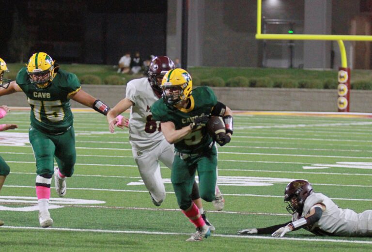 Aberdeen Roncalli's Brody Weinmeister breaks into the open during the Cavaliers' game against Milbank Friday, Oct. 11 at Dacotah Bank Stadium. Photo courtesy Reece Heinrich.