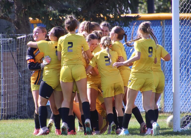 Members of the Groton girls soccer team celebrate their win over Dakota Valley in the Class A semifinals Saturdays Oct. 12 in Groton. The Tigers advanced to the state title game Saturday, Oct. 19 in Yankton. Aberdeen Insider photo by Robb Garofalo.