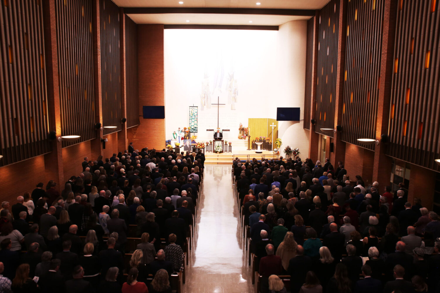 Hundreds of people line the pews at Our Savior’s Lutheran Church in Sioux Falls for former U.S. Sen. Tim Johnson’s funeral on Oct. 18, 2024. South Dakota Searchlight photo by Makenzie Huber.