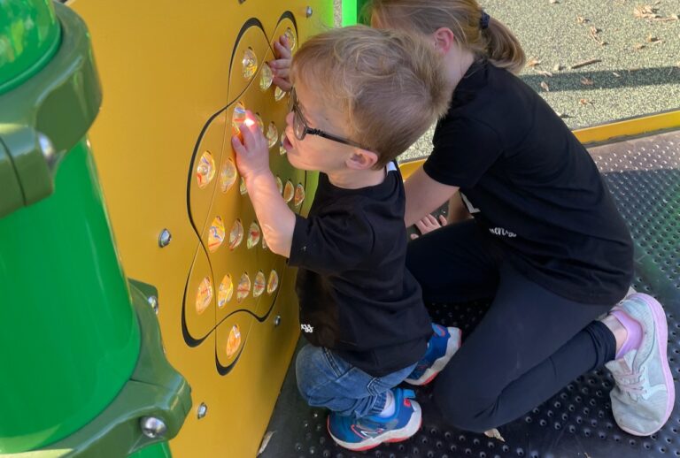 Henry Meyer plays at the inclusive playground at Storybook Land. Aberdeen Insider photo by Elisa Sand.