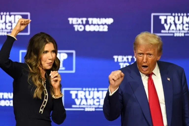 Republican President-elect Donald Trump with South Dakota Gov. Kristi Noem during a town hall campaign event in Oaks, Penn., on Oct. 14, 2024. Reuters photo by David Muse.