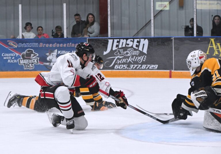 Aberdeen Wings forward Cade Moxham beats Austin Bruins goalie Jack Solomon for the game-winner in overtime Friday, Nov. 8 in the Odde Ice Center. Aberdeen Insider photo by Robb Garofalo.