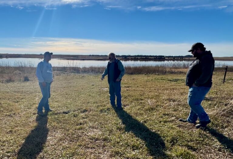 Scott Rau, Alan Rau and Darrin Rau discuss property lines and a fence erected by the South Dakota Department of Game, Fish and Park that restricts access to their property in near Salt Lake in Campbell County. Aberdeen Insider photo by Shannon Marvel.