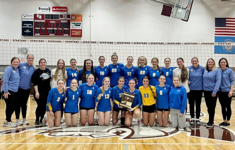 Members of the Aberdeen Central volleyball team pose with the state qualifier trophy following their SoDak 16 win over Spearfish Thursday, Nov. 14 in Spearfish. Courtesy photo