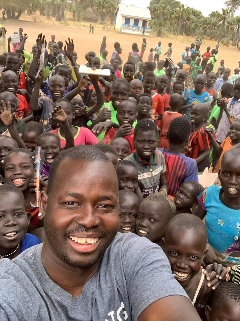 William Deng of Aberdeen during a visit to his home in South Sudan. Deng has written a book about his journey from South Sudan to South Dakota. Courtesy photo.