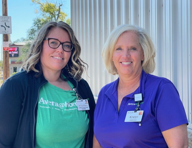 Avera@Home Agency Manager Whitney Eldeen, left, stands with Kirsten Molskness, social worker and volunteer coordinator. The organization has been in Aberdeen for 10 years. Aberdeen Insider photo by Elisa Sand.