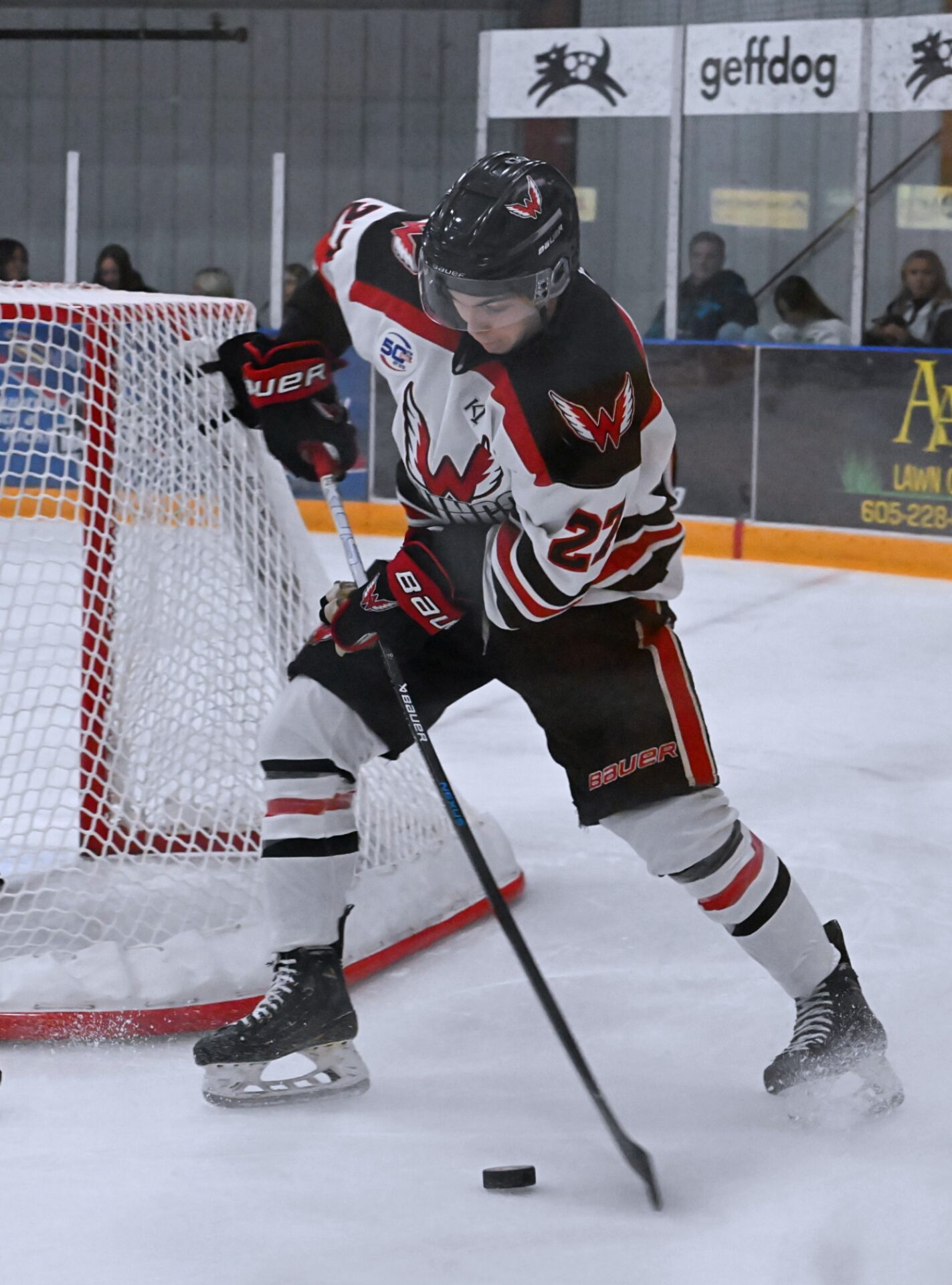 Aberdeen forward Leo Bulgakov gathers the puck behind the Watertown Shamrocks' net during the third period Wednesday, Nov. 27 at the Odde Ice Center. He scored all three goals in the Wings' 3-0 victory. Aberdeen Insider photo by Robb Garofalo.