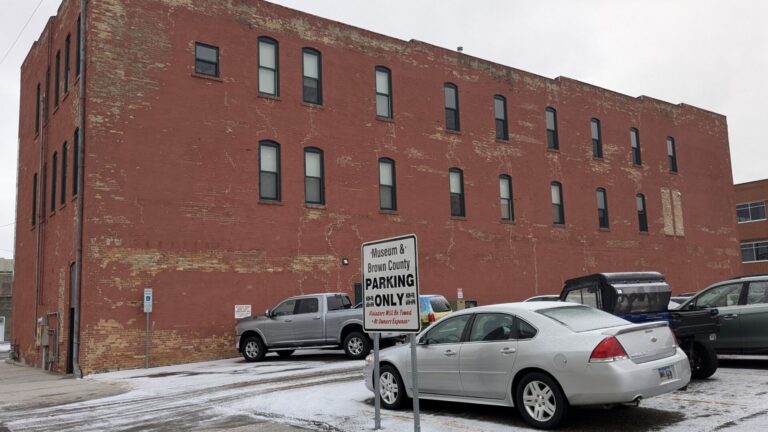 The Dacotah Prairie Museum would expand to the north in an area now used as a county parking lot under a plan Patricia Kendall, museum director, pitched to Brown County Commissioners during their Tuesday, Dec. 10 meeting. Aberdeen Insider photo by Scott Waltman.