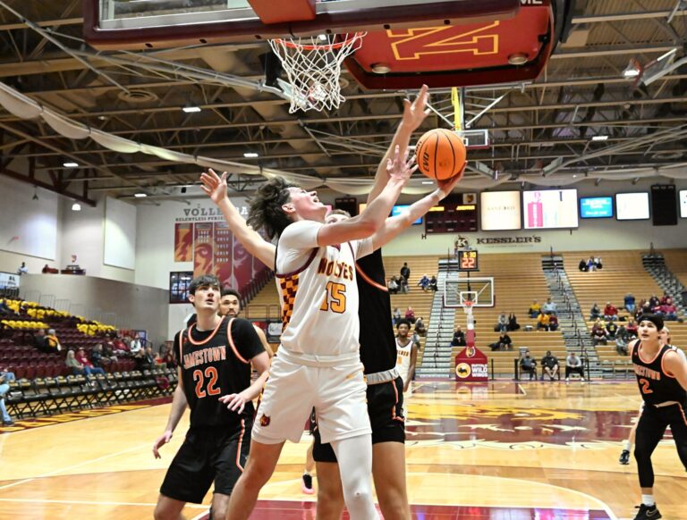 Northern State's Braeden Vanbockern goes up for a lay-in against Jamestown's Owen Hektner during the second half Monday, Dec. 16 at Wachs Arena. The Jimmies won the game. Aberdeen Insider photo by Robb Garofalo.