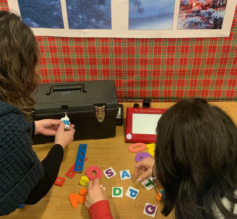 Employees at K.O. Lee Aberdeen Public Library are busy assembling the components of this year's holiday-themed escape room. Photo courtesy of K.O. Lee Aberdeen Public Library.