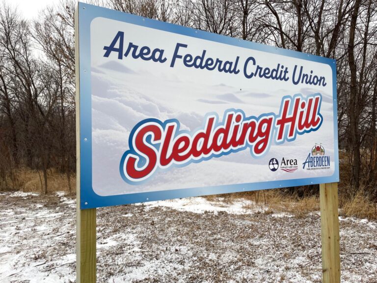 Snow is being produced at Area Federal Credit Union Sledding Hill east of Holgate Middle School. The snow-making machine and a pice of grooming equipment were purchased with money raised by the 2024 Leadership Aberdeen Class. Aberdeen Insider photo by Troy McQuillen.