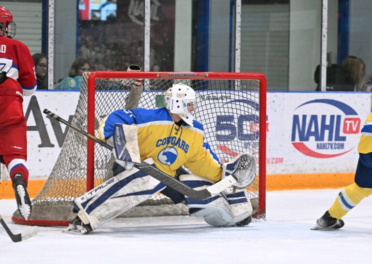 Aberdeen goalie Carson Hunstad slides across the crease after making a save during the second period against the Brookings Rangers Saturday, Jan. 11 inside the Odde Ice Center. Brookings won the game 3-2 in overtime. Aberdeen Insider photo by Robb Garofalo.