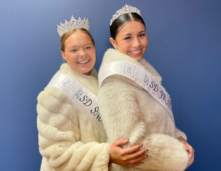 The 2025 South Dakota Snow Queen is, left, Katie Leadabrand of Watertown, who is standing with Junior Snow Queen Everleigh Kirk of Sisseton. Aberdeen Insider photo by Elisa Sand.