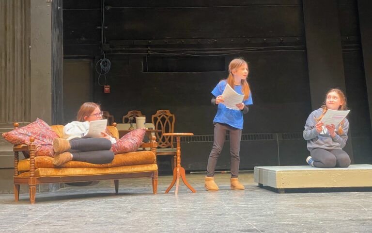 Aberdeen youth, from left, Elise Hoglund, Josie Hoglund and Eden Barkmeier rehearse the next Young People's Theatre production, "Harriet the Spy." Barkmeier is Harriet, who is spying on a variety of neighbors including, left, Mrs. Agatha K. Plumber and Nadine. The show runs Feb. 7-9 at the Capitol Theatre. Aberdeen Insider photo by Elisa Sand.