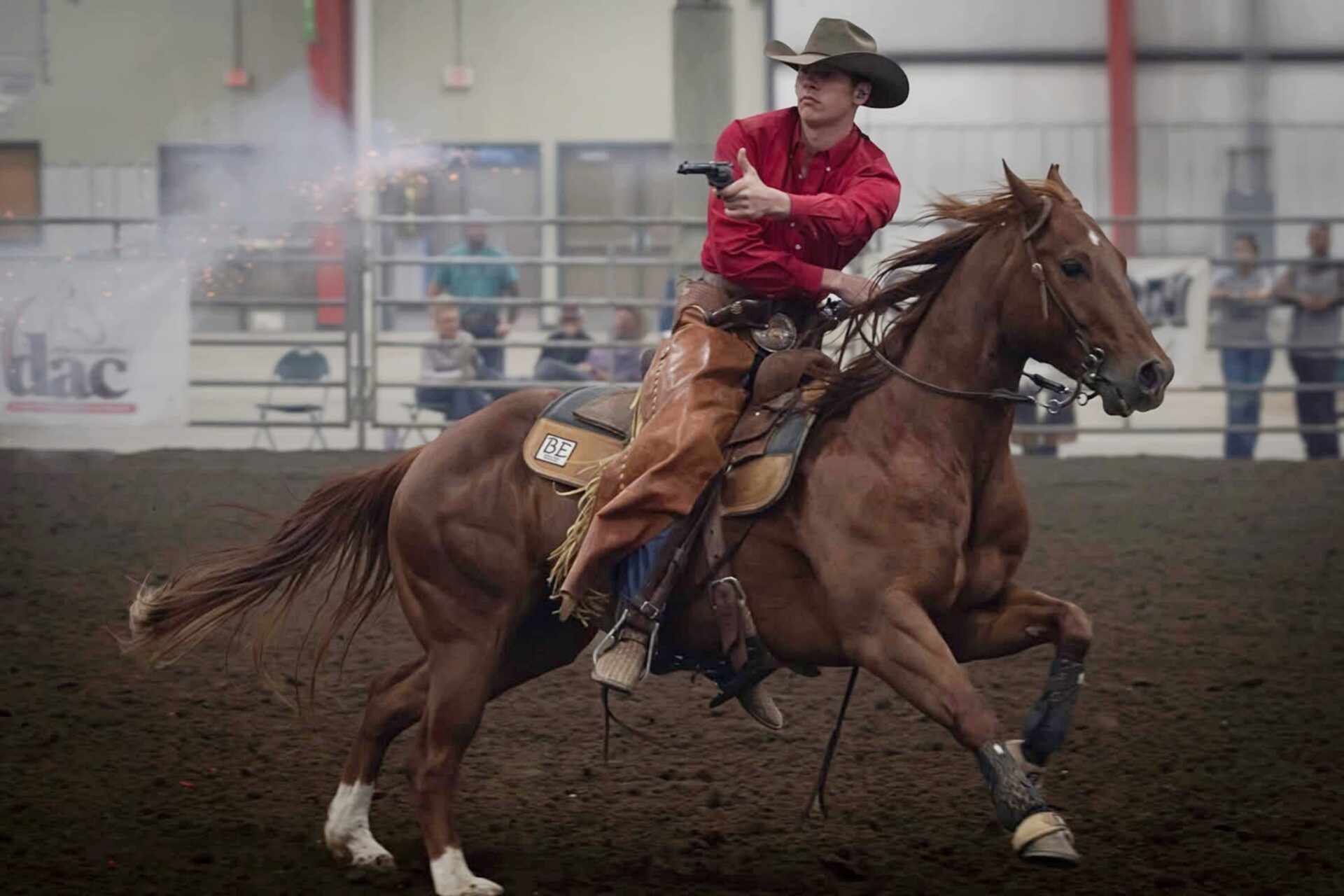 Groton's Turner Thompson aims and fires during the Cowboy Mounted Shooting Association United States Championships in Lincoln, Neb. Courtesy photo.