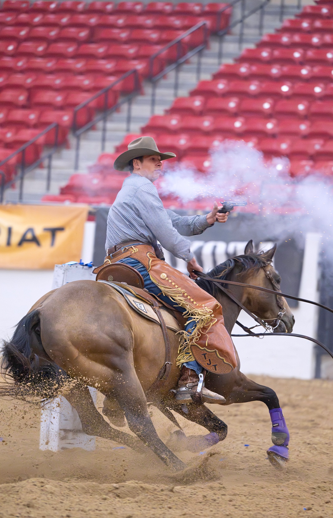 Turner Thompson of Groton fires at his target during the U.S. Western Championship mounted shooting event in Las Vegas. Courtesy photo.