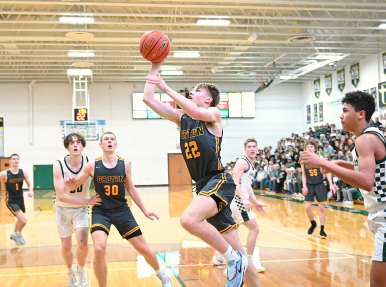 Groton Area's Karson Zak drives and scores two of his 14 points during Groton's 50-40 win at Aberdeen Roncalli Tuesday, Feb. 4 inside Roncalli Gym. Aberdeen Insider photo by Robb Garofalo.