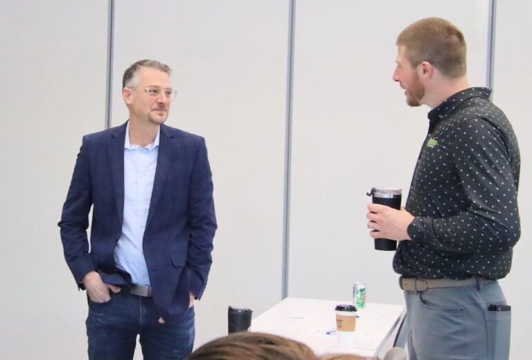 Mayor Travis Schaunaman, left, visits with City Councilman Rich Ward prior to the mayor's state of the city address on Thursday, Feb. 6 at K.O. Lee Aberdeen Public Library. Aberdeen Insider photo by Elisa Sand.