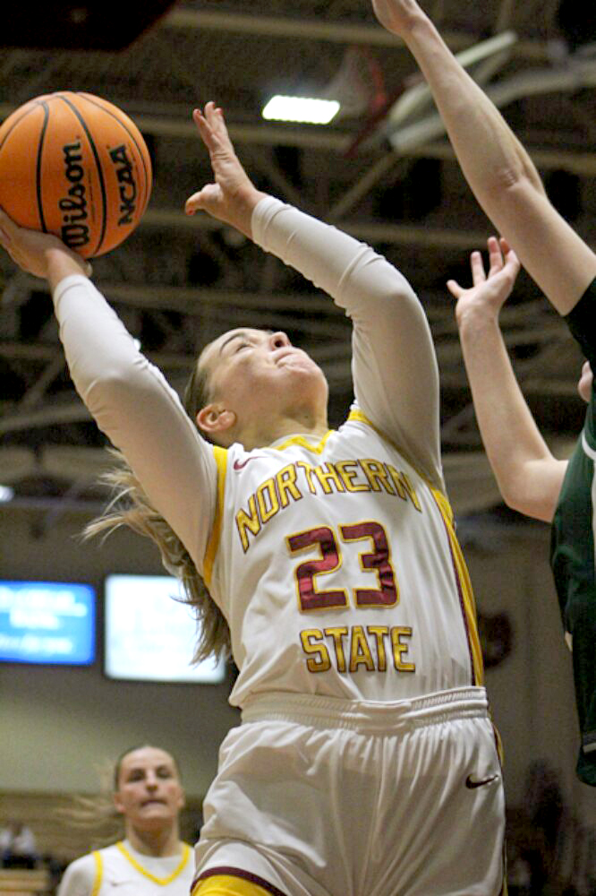 Northern State's Alayna Benike goes up for a shot after grabbing an offensive rebound during the first half against Bemidji State Saturday, Feb. 8 inside Wachs Arena. Benike had five rebounds during a 77-65 Wolves win. Aberdeen Insider photo by Allie Hoekman.