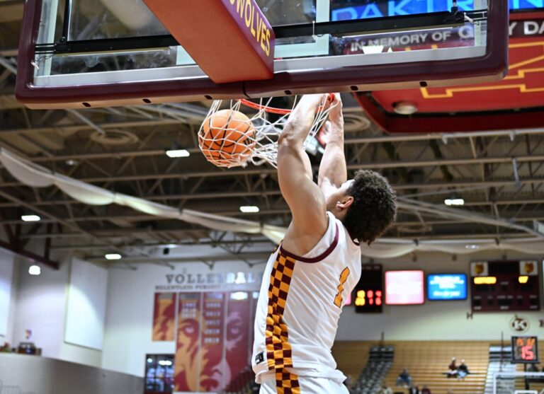 Tobi Obiora throws down a two-handed slam dunk in the second half of Northern State's game against Sioux Falls Friday, Feb. 21 inside Wachs Arena. Northern dropped it's 20th conference game, 77-66 to the Cougars. Aberdeen Insider phot by Robb Garofalo.