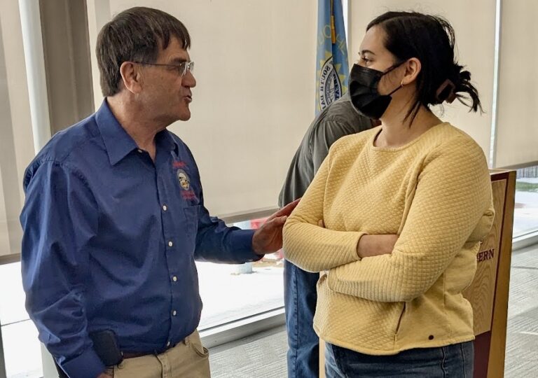 Rep. Al Novstrup, R-Aberdeen, left, visits with Jessica Puente Castro after the Saturday, Feb. 22 legislative coffee session at the Barnett Center on the campus of Northern State University. Aberdeen Insider photo by Scott Waltman.
