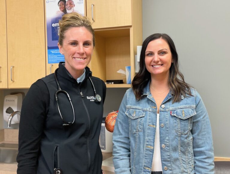 Sanford nurse practitioner Natalie Braun, left, stands with Tarah Heupel, senior marketing specialist at Sanford, who experienced a spontaneous coronary artery dissection, or a tear in her artery due to a block, about a year ago. Aberdeen Insider photo by Elisa Sand.