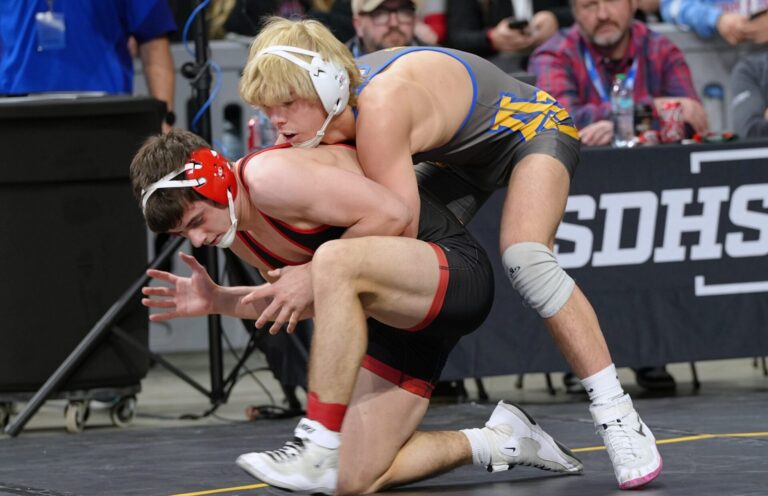 Aberdeen Central's Mason Schrempp battles Sturigs' Cade Willnerd in the 157-pound quarterfinals at the state wrestling meet Friday, Feb. 28 in Rapid City. Schrempp, the top seed at 157 pounds in Class A, will wrestle for a state championship Saturday, March 1. Photo courtesy of South Dakota Public Broadcasting.