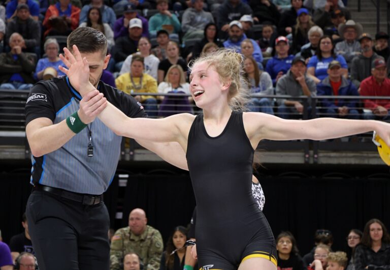 Groton Area's Liza Krueger celebrates after winning the state title at 100 pounds during the girls state high school wrestling tournament Saturday, March 1 in Rapid City. Photo courtesy of South Dakota Public Broadcasting.