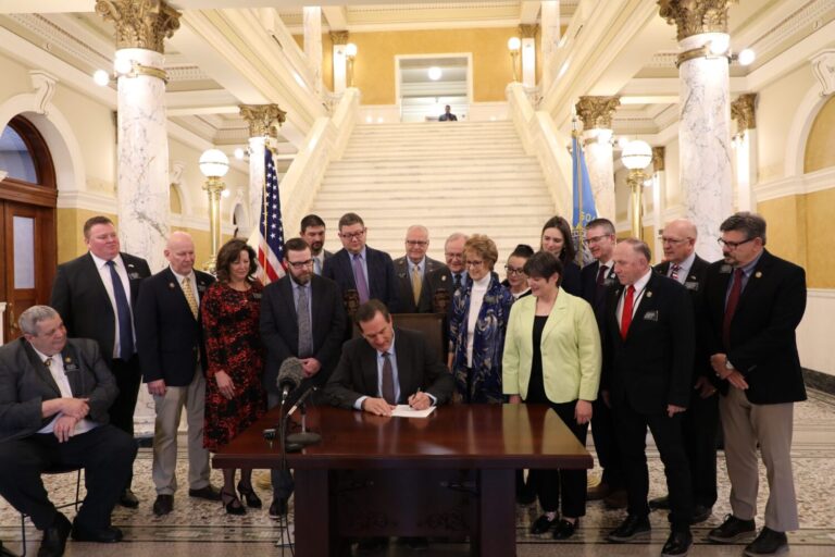 South Dakota Gov. Larry Rhoden signs his property tax bill into law on March 13, 2025, at the Capitol in Pierre. Photo courtesy of governor’s office.