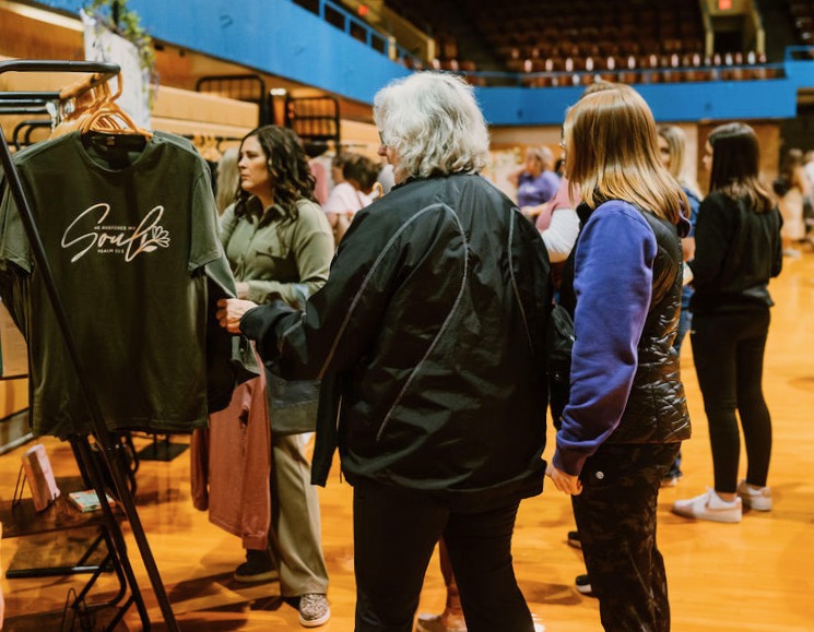 Attendees at the Renewed Women's Conference in 2024 browse through a selection of apparel available for purchase. Coutesy photo.