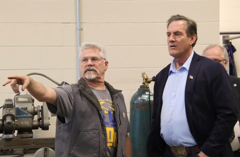 Central teachers including Mike Lillis, left, took the opportunity to visit with Gov. Larry Rhoden during a tour of the A-TEC Academy on Wednesday, March 19 in Aberdeen. Aberdeen Insider photo by Elisa Sand.