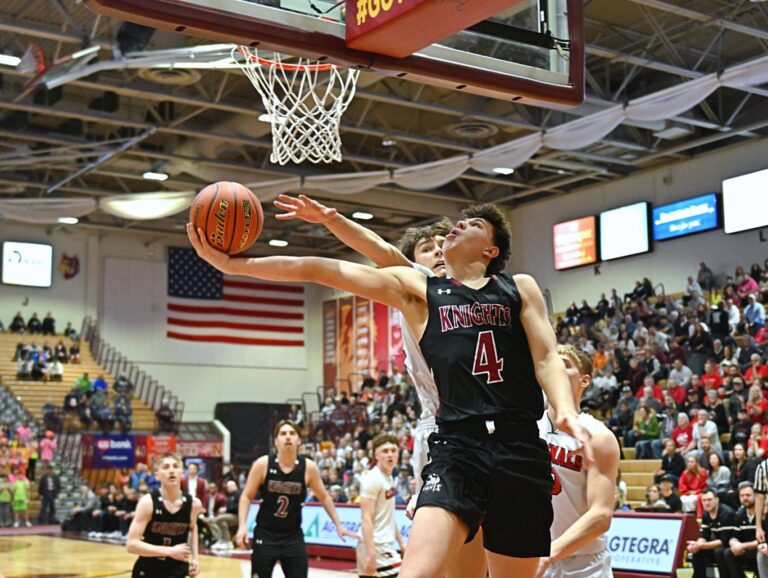 Aberdeen Christian's Brooks Jett scores on an up-and-under in the second quarter of the Knights' Class B quarterfinal against Dell Rapids St. Mary Thursday, March 20 inside Wachs Arena. The Knights fell to the Cardinals 66-45. Aberdeen Insider photo by Robb Garofalo.