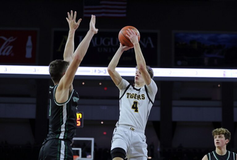 Groton Area's Ryder Johnson takes a pull-up jumper during the Class A state boys basketball tournament seventh-place game against Clark/Willow Lake Saturday, March 22 at the Sanford PREMIER Center in Sioux Falls. The Tigers won the game, and Johnson earned all-tournament honors. Photo courtesy of South Dakota Public Broadcasting.