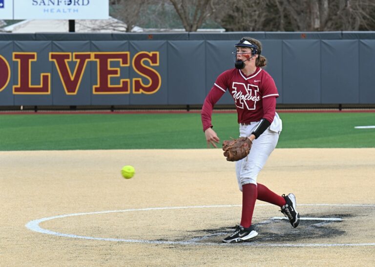 Northern State's Aune Boben delivers a pitch in the top of the third inning during game two of the Wolves' doubleheader against Minnesota State Moorhead Wednesday, March 26 at Koehler Field. The Dragons won both games. Aberdeen Insider photo by Robb Garofalo.