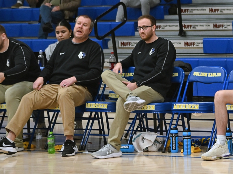 Colton McClemans, right, talks with assistant coach Trent Kurtz during an Aberdeen Central boys basketball game inside Golden Eagles Arena. McClemans has been promoted to head coach. Aberdeen Insider photo by Robb Garofalo.