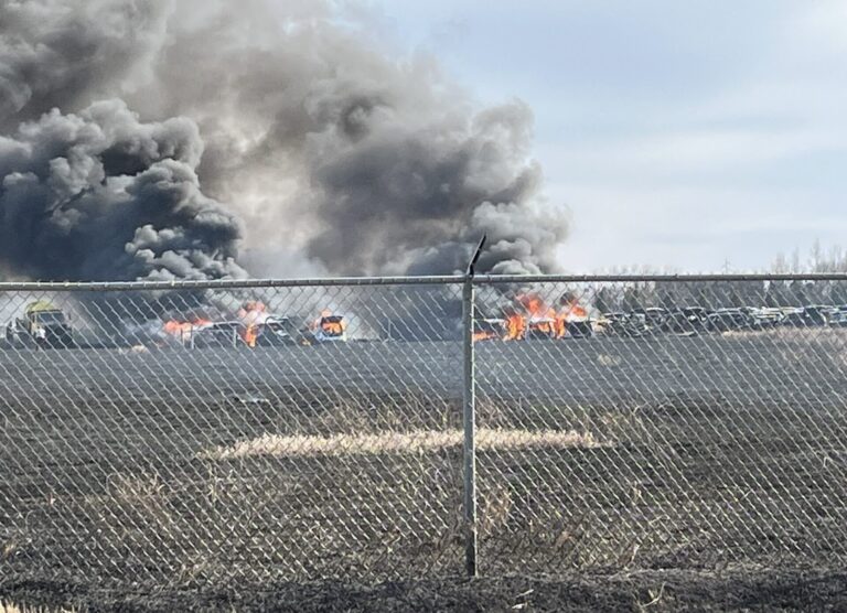 What started as a grass fire the evening of Sunday, March 30 spread and damaged or destroyed about 40 vehicles at Meyers Auto northeast of Aberdeen. Courtesy photo.