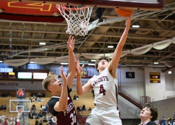 Aberdeen Christian's Brooks Jett drives to the hoop on Freeman's Oliver Waltner during a 2025 State B tournament game. Both teams return to the Barnett Center for this year's state tourney. Aberdeen Insider file photo by Robb Garofalo.