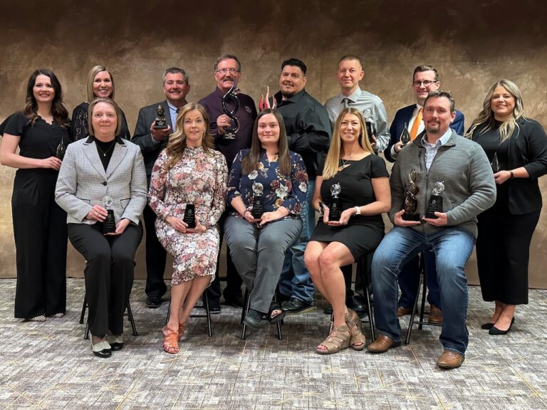 The 2025 ABBY Award honorees recognized Friday, April 4 are, back from left, Shelby Boettner, Krista Bau, Rod Tobin, Robin Bobzien, Kenny Hix, Jeff Evenson, Joe Mehlhaff, Ashley Wolf and, front from left, Becky Guffin, Tiffany Hoeft, Macy Oguejiofor, Becca Fliehs and Steve Lewno. Courtesy photo.