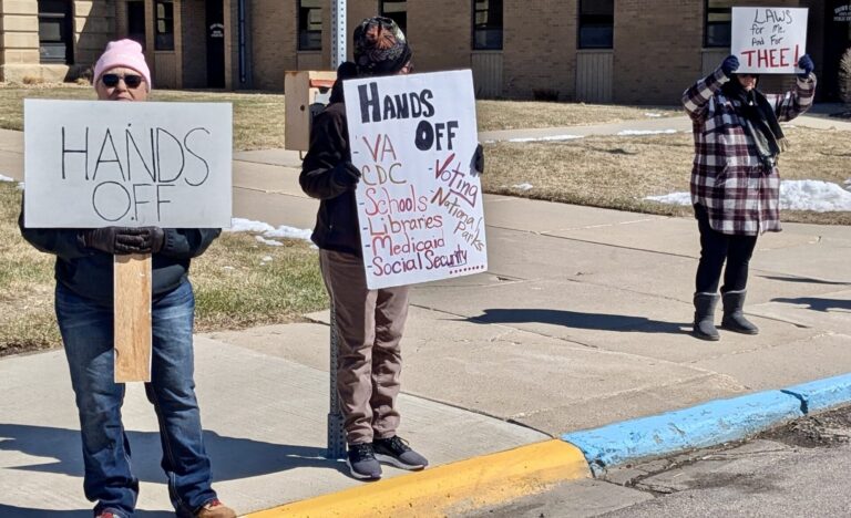 A small group of local residents gathered in front of the Brown County Courthouse on Saturday, April 5 for a Hands Off! rally. A larger Hands Off! protest organized by the Brown County Democrats is planned for Saturday, April 19. Aberdeen Insider photo by Scott Waltman.