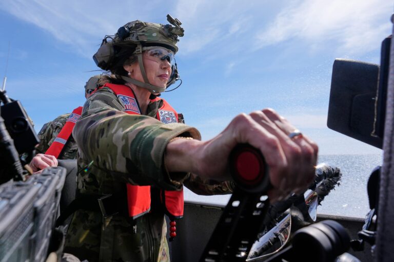 Homeland Security Secretary Kristi Noem pilots a U.S. Coast Guard Response Boat Small with the Maritime Security Response Team on March 16 in San Diego. Associated Press photo by Alex Brandon.