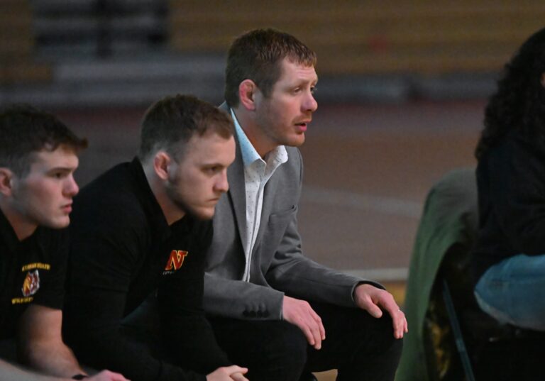 Rocky Burkett watches Northern State's wrestling dual with Sioux Falls Friday, Jan. 10 in the Barnett Center. Burckett announced he is leaving his position as head coach to join the Northern State University Foundation. Aberdeen Insider photo by Robb Garofalo.