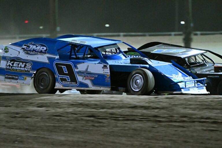 Aberdeen's Kent Arment races alongside Lucas Rodin of Marion, N.D., during the Modified feature race Friday, May 2 at the Brown County Speedway. Arment held off Rodin to take the checkered flag. Aberdeen Insider photo by Robb Garofalo.