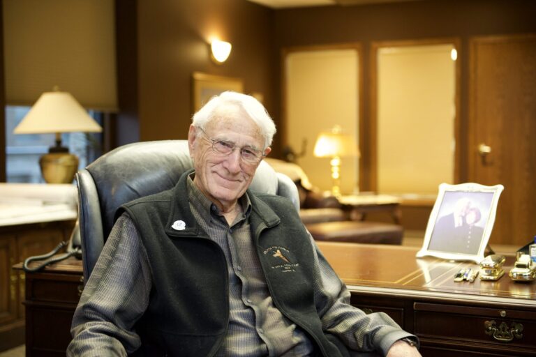  Tom Aman has written a book about the history of Northeastern Mental Health Center and its founding in Aberdeen. Aberdeen Insider photo by Troy McQuillen.